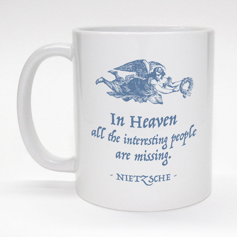 11 oz. coffee mug with angel design with amusing Nietsche quote.