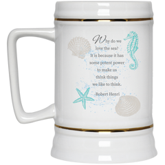 11 oz. coffee mug with seashell design and quote about the sea.